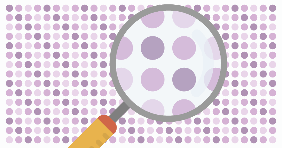 An illustration of a grid of dots being partly magnified by a magnifying lens